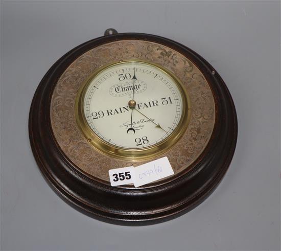 A Negretti & Zambra plate mounted oak aneroid barometer